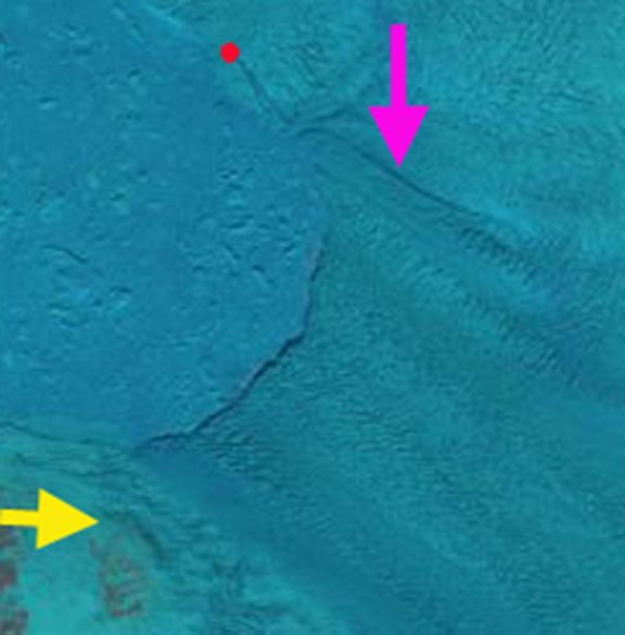 May 9 The pink arrow notes a prominent lateral rift, the yellow arrow a reference point.  Red dot is a transverse rift near the ice front.  No large rifts are apparent in the area of the main calving on May 9.